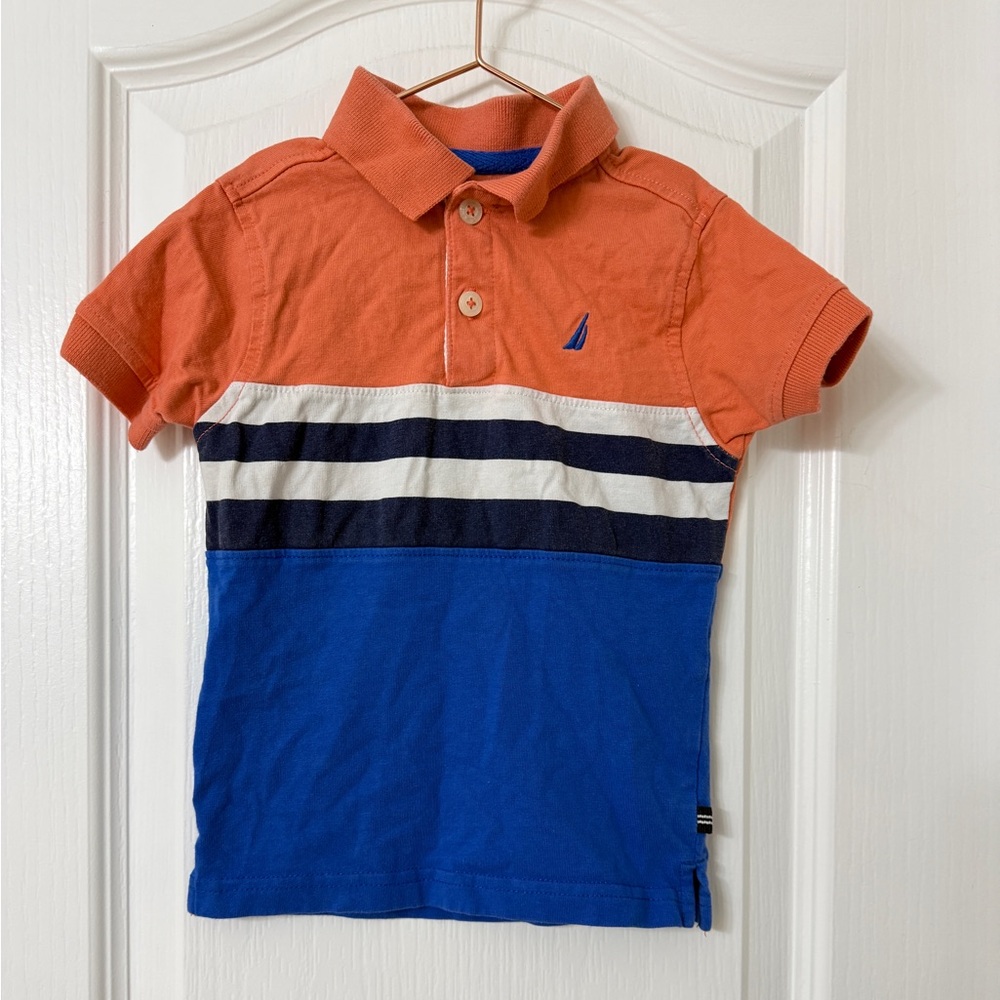 Nautica boy's polo shirt with an orange, striped, and blue color block Size 2T